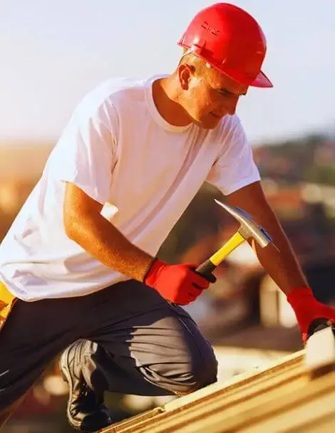 Roofing repair worker fixing active leak in El Cajon