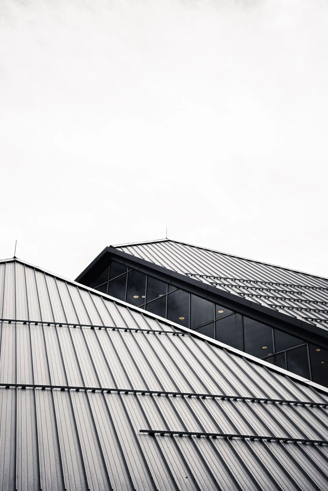 Modern vertical seam metal roof inspection and maintenance in San Diego, CA